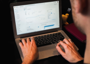 Shami IT Firm expert analyzing website organic traffic and SEO results on Google Analytics dashboard.